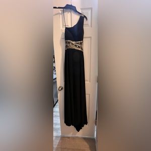 One shoulder, open back Betsy Adam black and gold formal dress